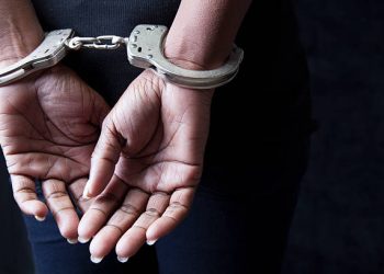 black woman in handcuffs